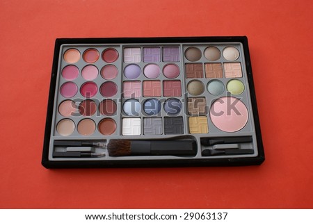 Makeup & brushes for eyes, lips, face in a box. Gift for her