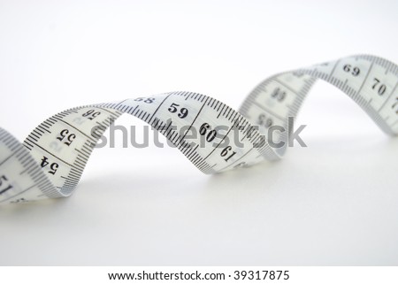 Measurement tape close-up on the white background