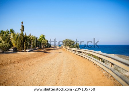 Curving dirt road near the Mediterranean sea, Cyprus.