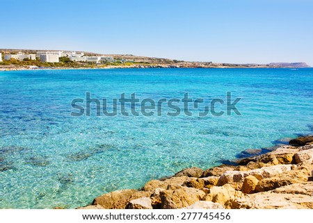 Sea shore. Turquoise sea water of Cyprus coast. Agia napa beach. Hotels view.