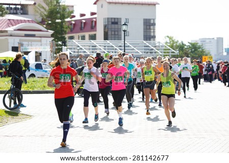 OMSK, RUSSIA - MAY 24 : A group of woman marathon runners compete at the Siberian Spring Half Marathon 2015 in Omsk, Russia, May 24,  2015.