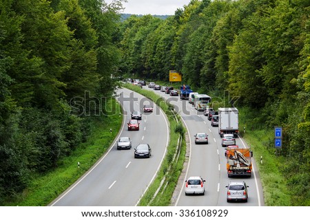 GOETTINGEN, GERMANY- SEPTEMBER 07, 2015: A light traffic jam with rows of cars. Traffic on the highway.