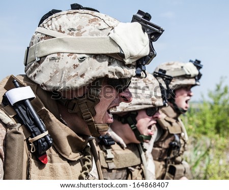 US Marines shouting at somebody showing war face