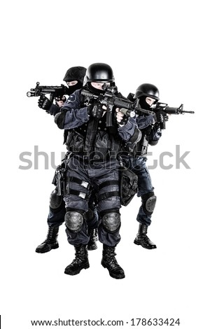 Special weapons and tactics SWAT team in action Special weapons and tactics SWAT team in action