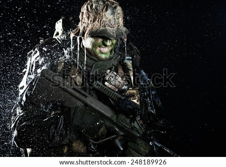 Jagdkommando soldier Austrian special forces with rifle in the rain