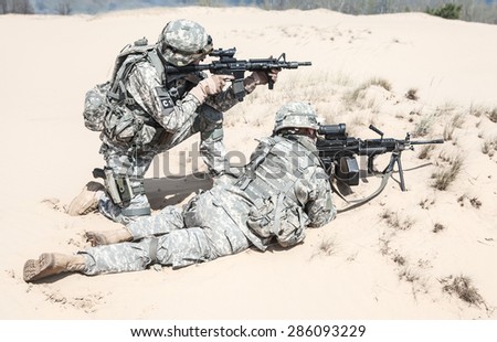 United States paratroopers airborne infantrymen in action in the desert