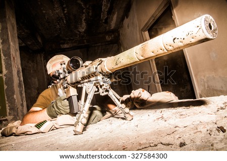 Navy Seal Sniper with rifle in action