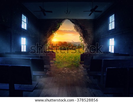 An empty church with an opening to a beautiful landscape