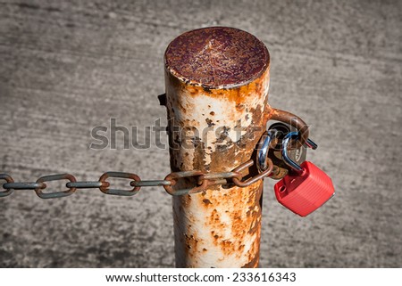 Rusty Metal Pole With Chains