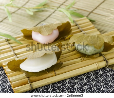 Wagashi; Traditional Japanese sweets on the bamboo tray.