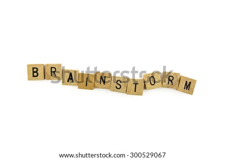 Brainstorm word wooden alphabet blocks on white background from top view
