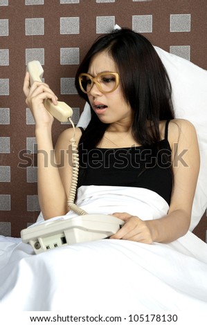Woman hear a bad call while in bed before sleep