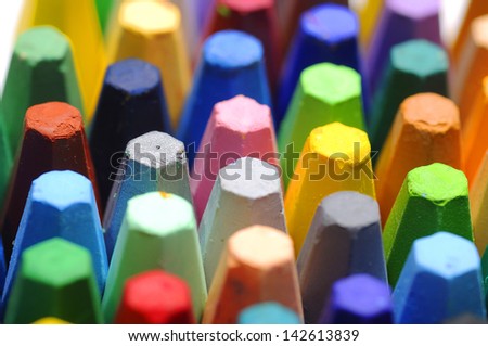 The stacks of crayon shot over white background