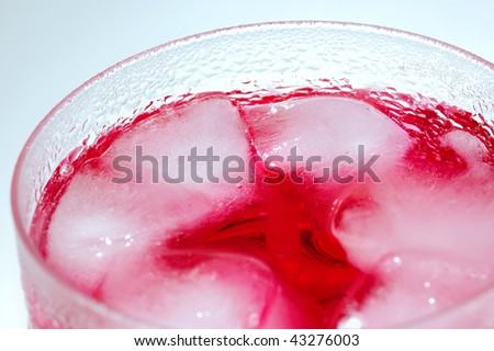 Red Soda Drinks with ice cube in the glass