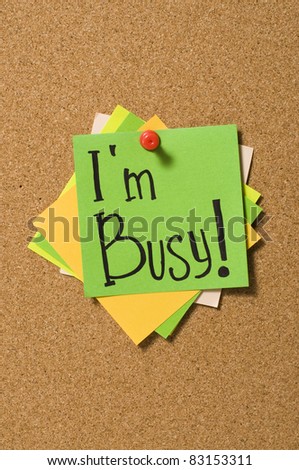 I\'m busy write on the paper attached on cork board