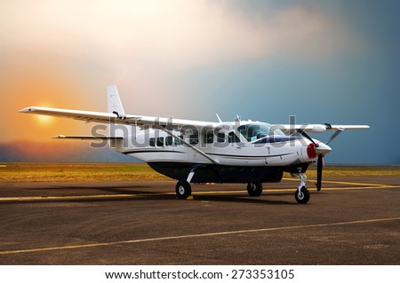 Propeller airplane parking at the airport.