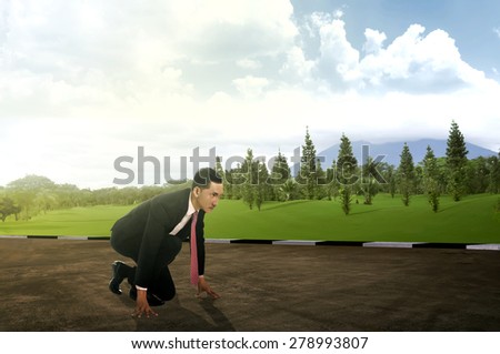 Young business man running on the street. Business career conceptual image