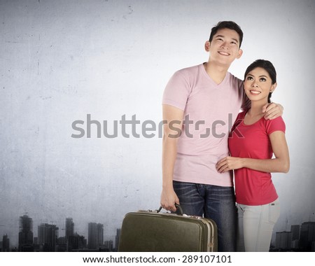 Young asian couple travel around the world. Couple traveling concept