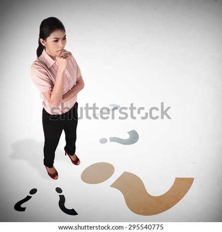 Asian business woman thinking something, taken full body