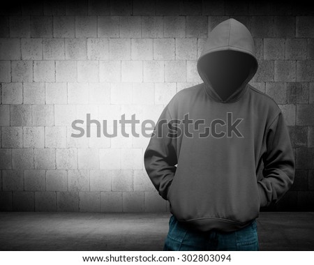 Computer hacker silhouette of hooded man. Threat of your security