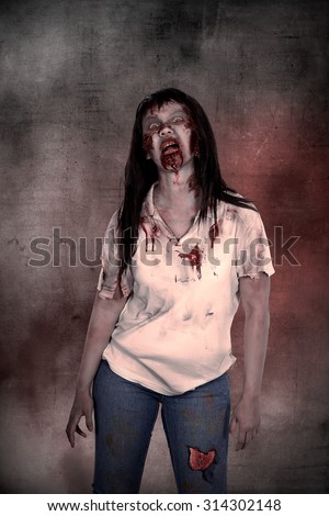 Creepy asian female zombie over grunge background