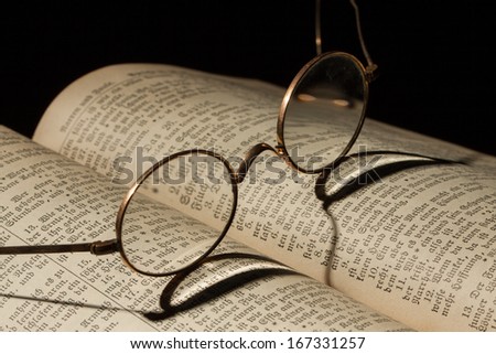 Old Family Bible with eyeglasses