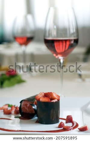 Sweet cake strawberries and chocolate with wine