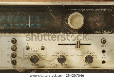 tone controls of old stereo receiver with dust and cobweb (with lighting effect)