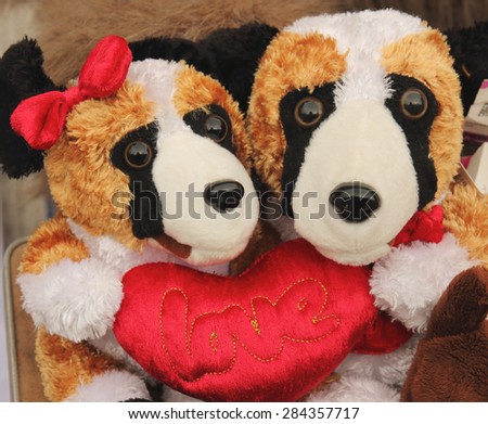 bear dolls to hold red love heart pillow