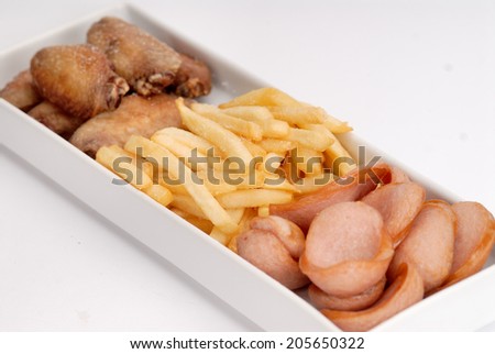Mixed grilled and fried meat platter and pickles