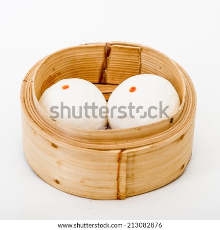 yumcha, dim sum in bamboo steamer, chinese cuisine,Chinese steamed bun and sweet creamy stuff,Chinese Buns With Sweet Bean Paste Filling In A Bamboo Steamer