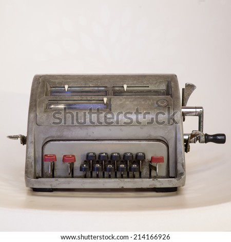 writing machine,Antique typewriter against a crisp white backdrop.