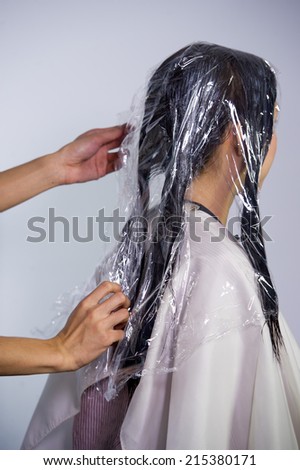 The process of hair coloring,hair coloring,Hair Colouring in process,Woman gets new hair colour,Hair Colouring in process,Hair plastic wrap,
