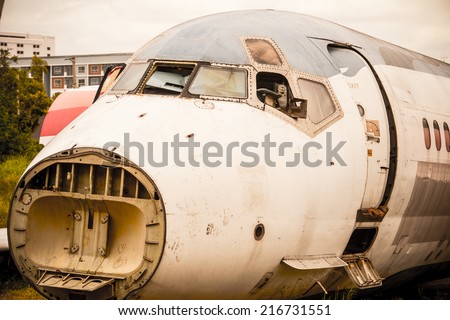 Abandoned Airplane,old crashed plane with cloudy sky,plane wreck tourist attraction,Old plane wreck