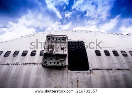 Emergency old aircraft,Abandoned Airplane,old crashed plane with cloudy sky,plane wreck tourist attraction,Old plane wreck