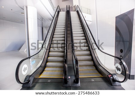 escalator,Up and down escalators in public building.