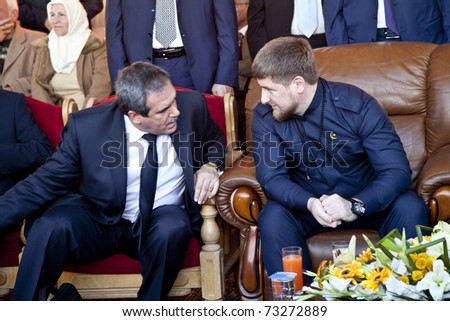 AMMAN, JORDAN - MAR 15: Chechen president Ramzan Kadyrov (R) advices vice president to donate 100,000 USD to Jordanian Deaf & mute foundation, during visit to Jordan.  March 15, 2011 in Amman, Jordan.
