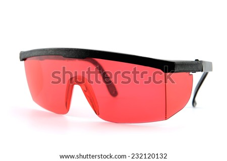 photo red protective spectacles on white background isolated
