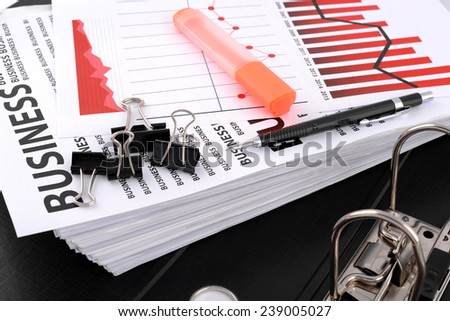 Different types of charts, documents business with a green pen and red highlighter pen