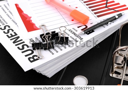 Different types of charts, documents business with a pen and red highlighter pen