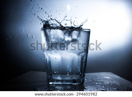 Water Splash in water glass silhouette