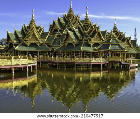 thai wood castle temple ancient siam and blue sky with lake