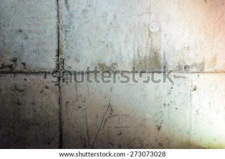 Cement blocks in a dirty cement wall