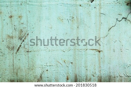 old sheet iron with surface coating with chipped paint green
