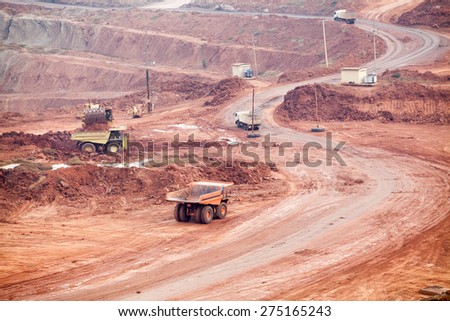 Part of a pit with big mining truck working