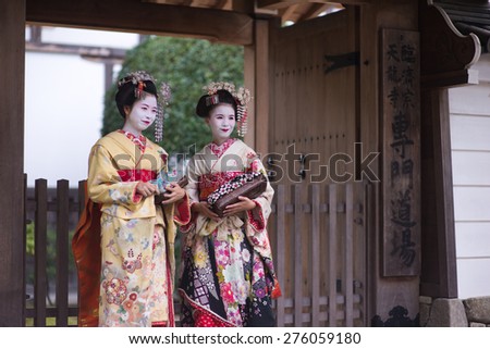 Kyoto, Japan - October 12, 2014 :Two geisha are in Kyoto, Japan.
