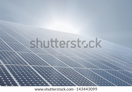 Big solar cell plant with sun rays