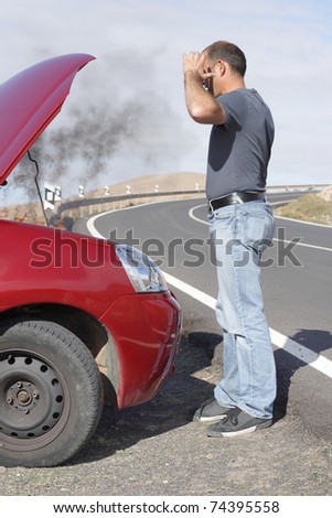 man having a car breakdown