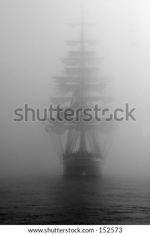 Ship in fog. Black and white photo.
