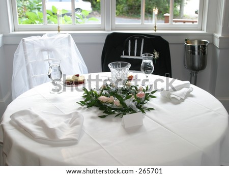 Bride and groom table setting.